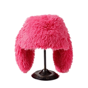 Cute bright pink plush bucket hat with rabbit ears for women’s winter warmth