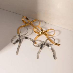 Chic 18k gold and silver stainless steel bow earrings with a flat snake chain texture