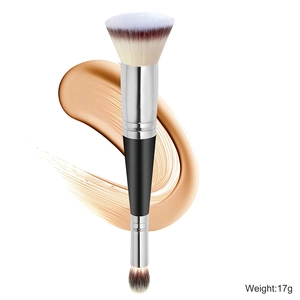 Dual-ended makeup brush with flat foundation and round concealer bristles on white background