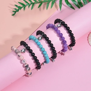 Pink zebra stone couple bracelets with magnetic heart charms and metal star pendants