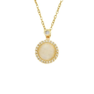 Golden necklace with a round cat eye stone pendant surrounded by small crystals