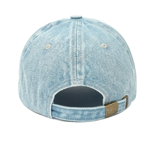 Close-up of light blue washed denim baseball cap with metallic buckle adjustment on back