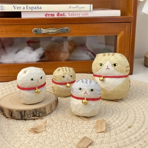 Set of 4 hand-carved wooden cat figurines with red collars and golden bells