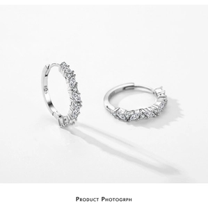 Close-up of S925 sterling silver earrings with marquise and round cut zirconia stones
