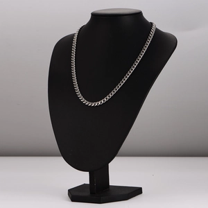 6mm silver stainless steel cuban chain necklace displayed on a black neck mannequin