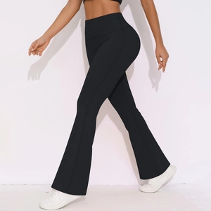 Detail shot of black high waist flared yoga pants showing slimming fit and flared leg