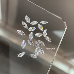 Macro view of 3x6mm marquise butterfly zircon crystals for nail art with aurora shine