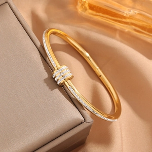 Polished rose gold plated titanium steel bracelet with triple pave set zircon sliders