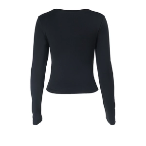 Rear view of slim fit black long-sleeve crop top with crew neckline on white background