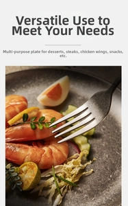 Detail of vintage grey stainless steel fork with salad, shrimp, and boiled egg on plate