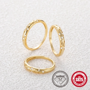 Elegant S925 sterling silver gold rings with star engravings and sparkling moissanite stones