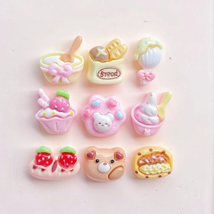 Detailed grid view of 9 resin charms featuring tiny strawberry ice cream and bread shapes