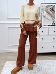 Women's two-piece knitted set with striped beige sweater and brown wide-leg pants
