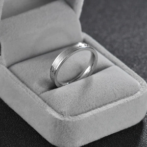 Detail of silver stainless steel ECG ring in a premium gray velvet jewelry gift box