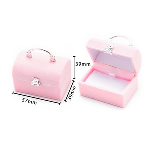 Pink velvet mini trunk jewelry box with silver bear clasp and handle detail view