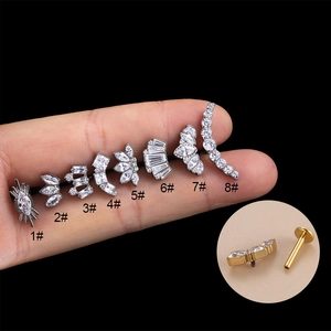 Titanium marquise crown labret stud earrings with white zircon on finger