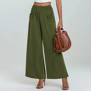 Close-up of high-waisted elastic waistband and large side pockets on army green pants