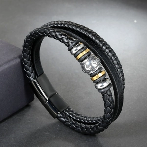 Men's multilayer braided leather bracelet with silver and gold charms and magnetic clasp