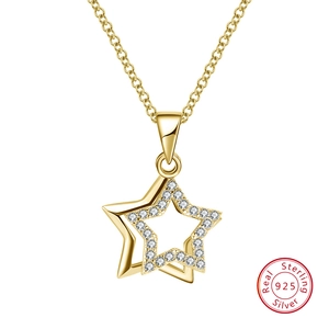 Close-up of gold 925 sterling silver star pendant with pavé cubic zirconia inlay