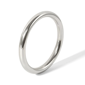 Detailed view of polished silver stainless steel hollow tube bangle with minimalist finish