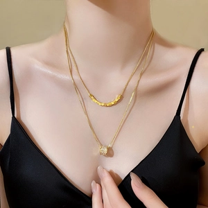 18k gold-plated double-layer necklace featuring a sparkling zircon cylindrical pendant