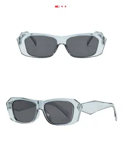Detail view of rectangular light blue sunglasses frames and gray lenses at two angles