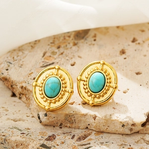Vintage oval turquoise stud earrings in 18K gold finish with intricate metal textures