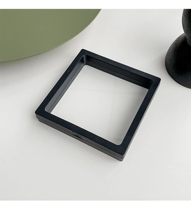 Close-up of black PE film jewelry display box with transparent suspension window