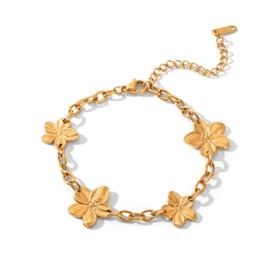 Close-up of golden stainless steel flower bracelet with five-petal charms and lobster clasp