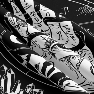 Macro shot of tarot-style black and white fabric showing detailed crystal and occult patterns