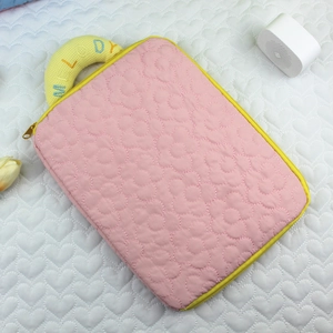 Quilted floral laptop sleeve in pink with yellow handles and Melody embroidery