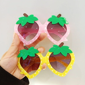 Cartoon strawberry sunglasses for kids with cute polka dots and gradient lenses