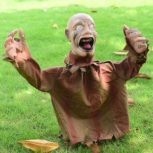 Scary Halloween animated zombie prop with glowing eyes for outdoor garden decor