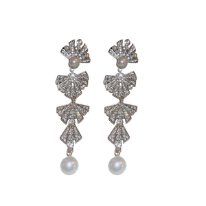 Silver needle earrings with layered fan shapes, pavé rhinestones and pearl tassels