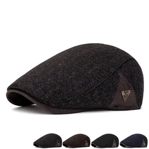 Men's wool knit beret cap for winter with metal logo detail in four classic colors