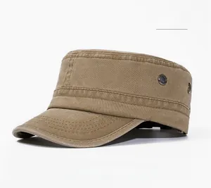 Close-up of khaki flat top military cap showing cotton canvas texture and metal eyelets