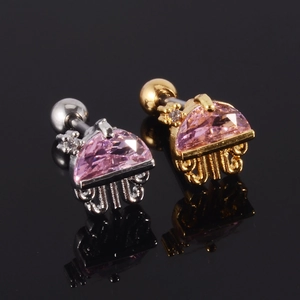 Detailed view of jellyfish cartilage studs with pink pear-shaped crystals and screw backs