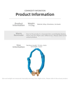 Détails techniques de la chaîne de corps en perles bleues avec pendentifs papillon