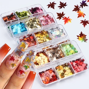 6-grid box of holographic laser maple leaf nail art sequins with colorful glitter finish