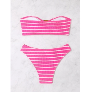 Detailed flat lay of pink and white striped bandeau bikini with textured seersucker fabric