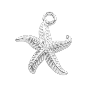 Detailed macro view of silver 304 stainless steel starfish pendant with textured engraving