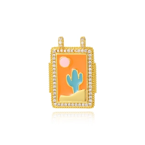 Detail of gold enamel cactus and sun pendant with cubic zirconia inlay for DIY jewelry