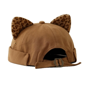 Brown canvas docker hat featuring leopard print cat ears and an adjustable metal back buckle