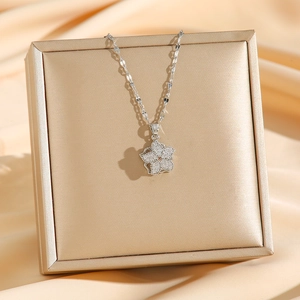 Elegant rotating clover flower pendant necklace in silver stainless steel with zircons