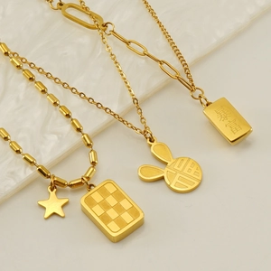 Three gold stainless steel necklaces with rabbit, star and Chinese wealth pendants