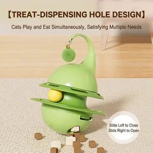 Green interactive cat tumbler toy with treat dispenser and spinning ball tracks