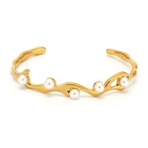 18K gold plated wave cuff bracelet featuring five elegant pearls on textured metal