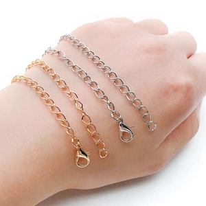 Lobster clasp chain extensions in gold, rose gold, and silver finishes for bags