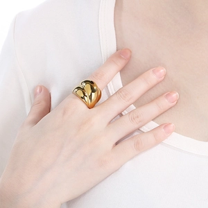 Polished 18K gold plated stainless steel crossover ring with chunky minimalist design