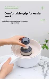 Brosse à vaisselle avec réservoir de liquide et poignée ergonomique pour casseroles